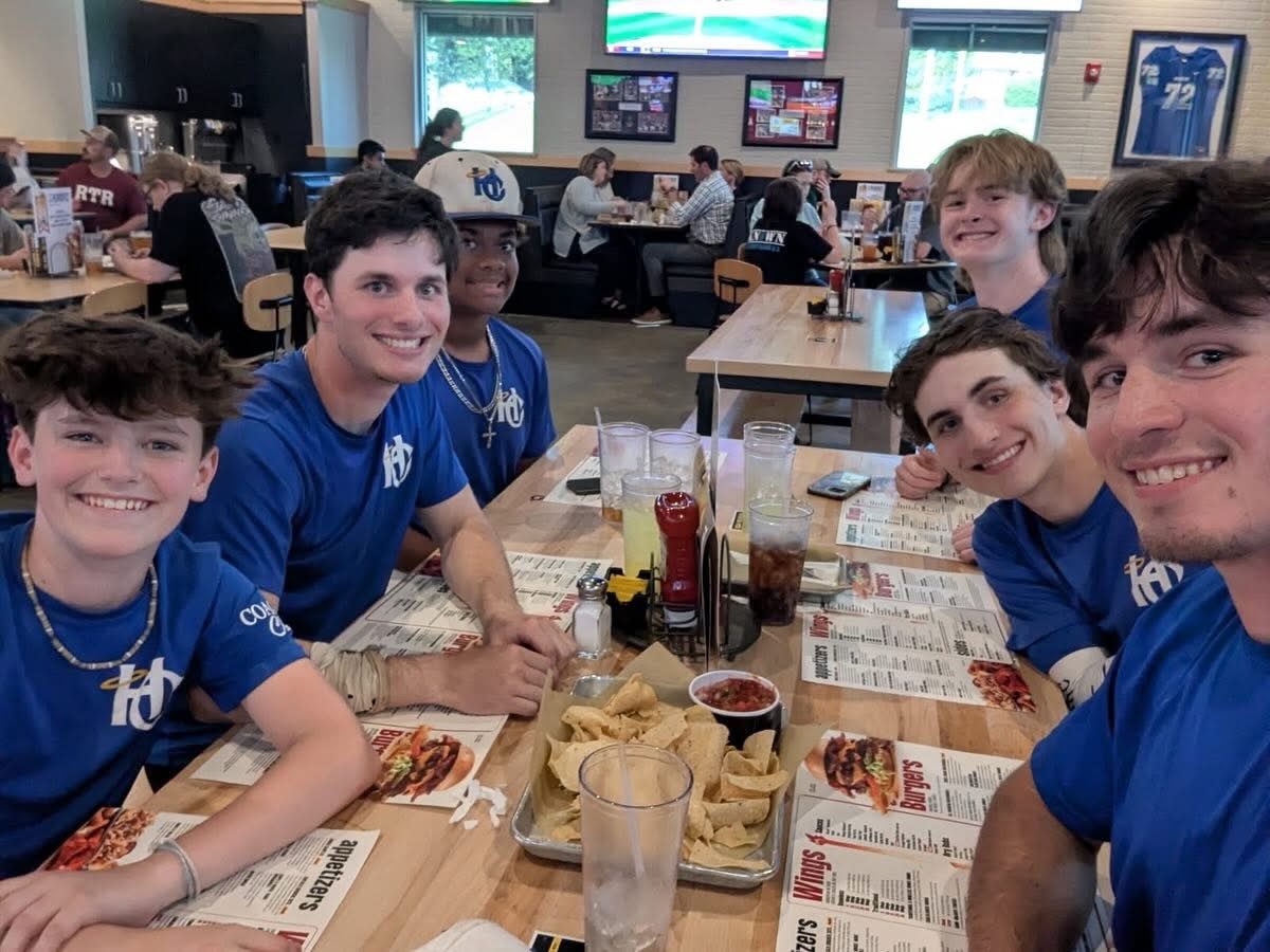 HC Baseball family enjoying dinner together at Buffalo Wild Wings after Tippy Tuesday