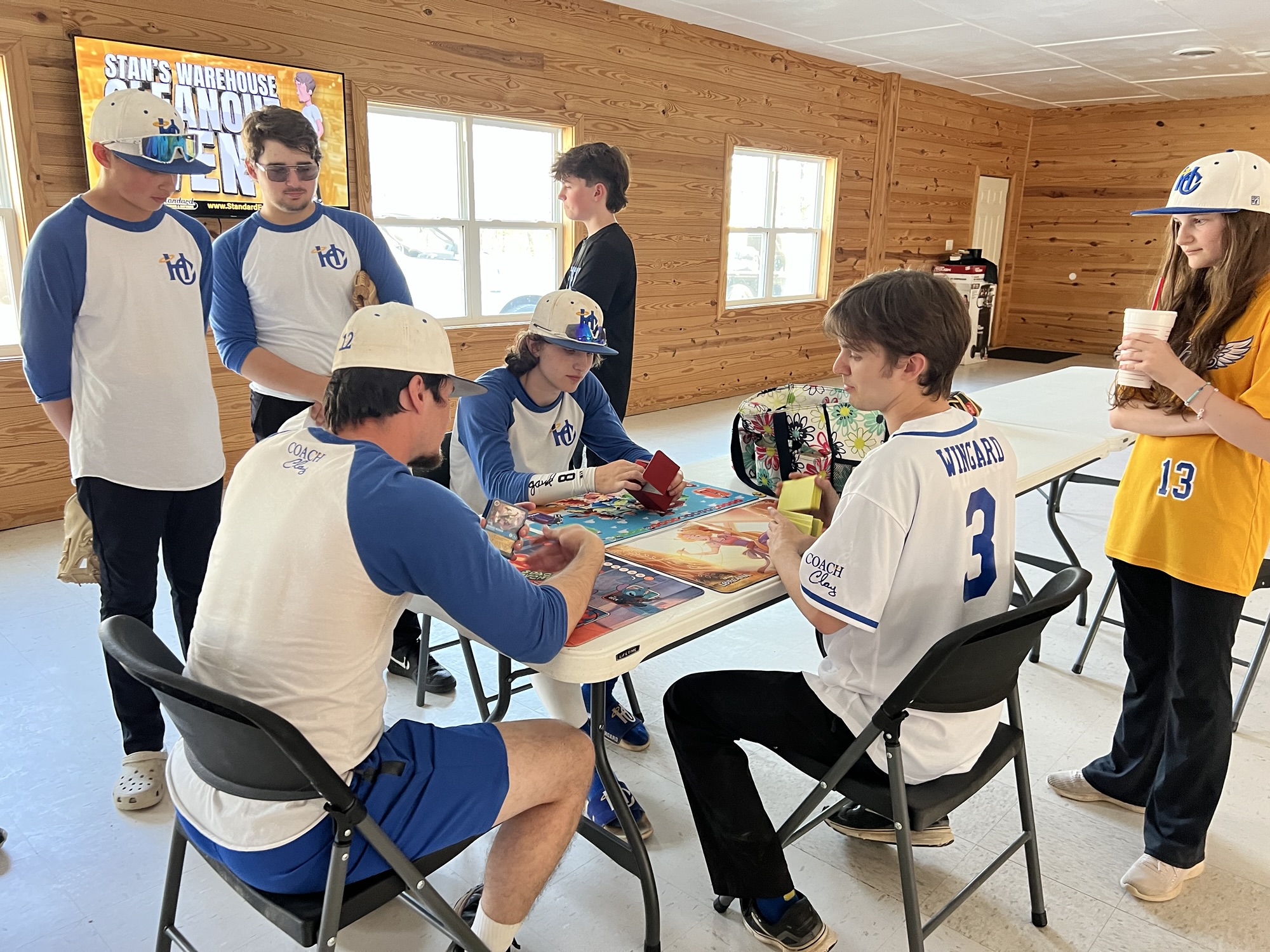 Angels enjoying a tabletop game during the retreat