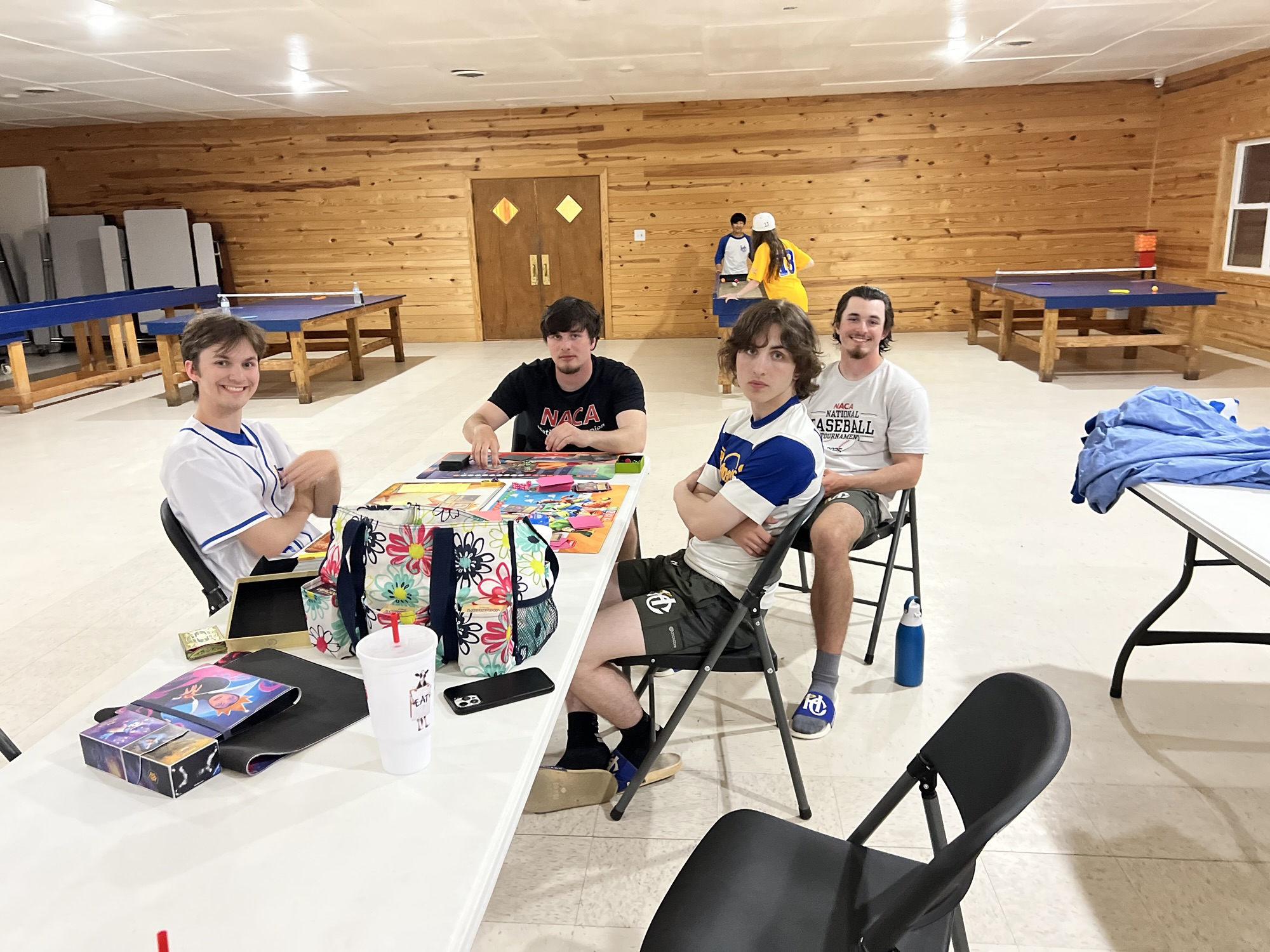Teammates spending time together over a tabletop game