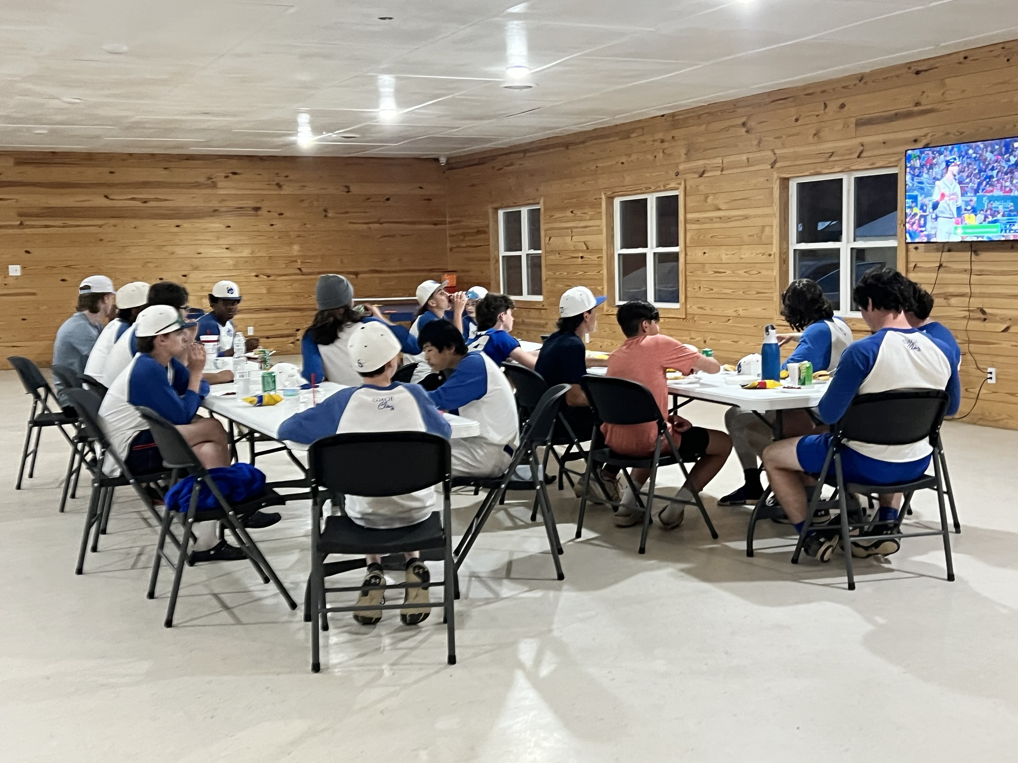 The HC Angels sharing a meal and fellowship around the tables